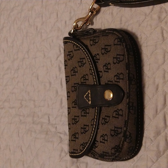 Dooney & Bourke Handbags - Vintage Dooney & Bourke Signature Black Wristlet. Tan inside.